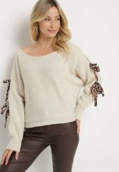 Beżowy Sweter z Moherem o Nietoperzowym Kroju z Ozdobnymi Wiązaniami w Panterkę Semiri. Brązowe swetry nierozpinane damskie Born2be, s, bez wzorów, z jeansu, eleganckie, bez kołnierzyka, bez ramiączek. Za 64.99 zł.