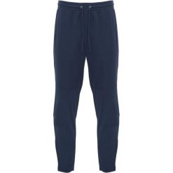 Spodnie Do Biegania Dla Dorosłych Unisex Neapolis. Niebieskie spodnie sportowe damskie ROLY, na lato, bez wzorów, sportowe, do biegania. Za 84.99 zł.