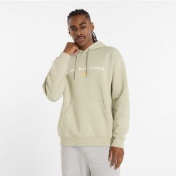 Bluza męska New Balance MT51516OVN – zielona. Zielone bluzy sportowe męskie New Balance, m, z aplikacjami, z bawełny, z kapturem. Za 189.99 zł.