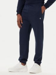 Calvin Klein Jeans Spodnie dresowe LV04RD241G Granatowy Regular Fit. Niebieskie spodnie sportowe męskie Calvin Klein Jeans, m, bez wzorów, z bawełny. Za 309.99 zł.