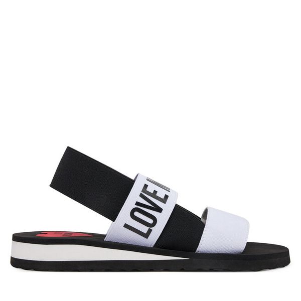 Sandały LOVE MOSCHINO. Białe sandały damskie Love Moschino, bez wzorów, bez obcasa, na płaskiej podeszwie, bez zapięcia. Za 329.99 zł.