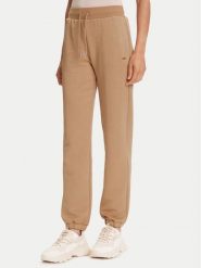 Guess Spodnie dresowe V5YB06 KBSL2 Beżowy Regular Fit. Brązowe spodnie dresowe damskie Guess, z aplikacjami, z dresówki. Za 259.99 zł.