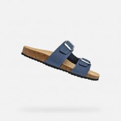 Sandały GEOX D BRIONIA Niebieski. Niebieskie sandały damskie Geox, bez wzorów, ze skóry, bez obcasa, bez zapięcia. Za 266.99 zł.