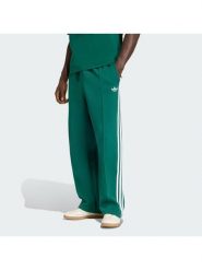 Adidas Spodnie dresowe adicolor Spacer Track KD4088 Zielony Baggy Fit. Zielone komplety dresowe męskie Adidas, m, bez wzorów, z bawełny. Za 349.99 zł.