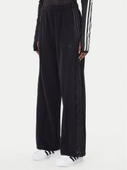 Adidas Spodnie dresowe Firebird Lace KD0351 Czarny Loose Fit. Czarne spodnie dresowe damskie Adidas, bez wzorów, z dresówki. Za 319.99 zł.