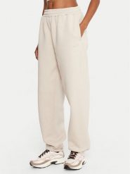 Reebok Spodnie dresowe Reebok X Ewa Chodakowska RK25304CCW Beżowy Regular Fit. Brązowe spodnie dresowe damskie Reebok, bez wzorów, z dresówki. Za 179.99 zł.