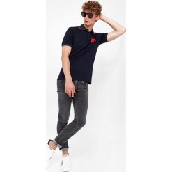 Jeansy męskie DOLCE & GABBANA. Jeansy męskie Dolce & Gabbana, z jeansu. Za 4,559.00 zł.