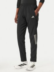 Adidas Spodnie dresowe Astro KC4947 Czarny Regular Fit. Czarne spodnie dresowe damskie Adidas, bez wzorów, z dresówki, sportowe. Za 299.99 zł.