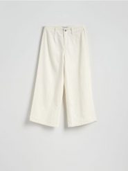 Jeansy culotte z wysokim stanem - złamana biel. Jeansy damskie Reserved, bez wzorów, z bawełny, z podwyższonym stanem. Za 139.99 zł.