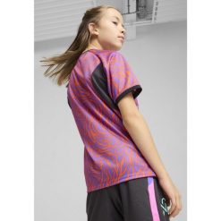 Młodzieżowa koszulka piłkarska Neymar Jr Creativity PUMA. Fioletowa bluzki damskie Puma, m, bez wzorów, młodzieżowe, bez kołnierzyka, bez ramiączek. W wyprzedaży za 94.00 zł.