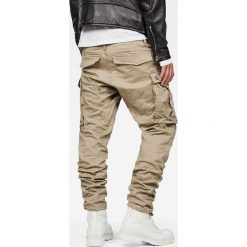 G-Star Raw - Spodnie. Spodnie materiałowe męskie G-Star Raw, bez wzorów, z bawełny. W wyprzedaży za 339.90 zł.