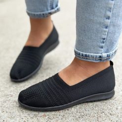 Czarne sportowe buty damskie Potocki 16020. Czarne obuwie sportowe damskie POTOCKI, bez wzorów, z tkaniny, bez zapięcia. Za 89.00 zł.
