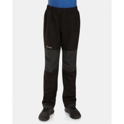 Pantaloni outdoor softshell per bambini Kilpi RIZO-J. Czarne spodnie sportowe damskie Kilpi, na lato, bez wzorów, z softshellu, sportowe, outdoorowe. Za 179.35 zł.