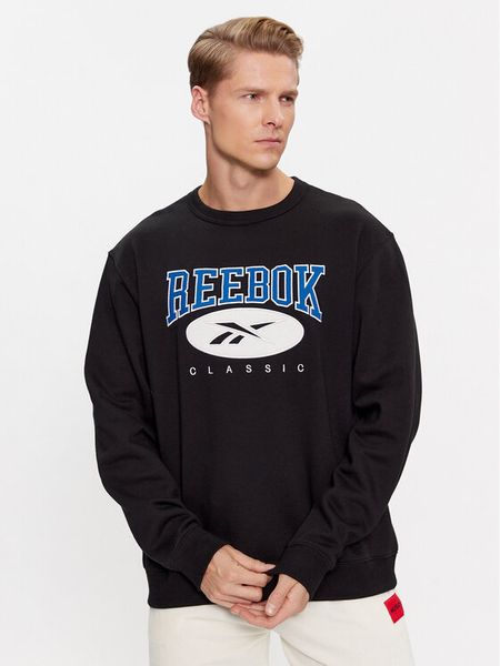 Reebok Bluza Archive Essentials II0696 Czarny Regular Fit. Czarne bluzy męskie Reebok, l, bez wzorów, z bawełny, bez ramiączek, bez kaptura. Za 169.99 zł.