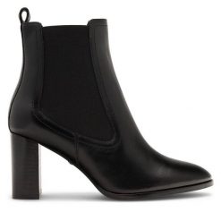 Botki GINO ROSSI. Czarne botki damskie Gino Rossi, bez wzorów, bez obcasa, na słupku, bez zapięcia. Za 379.99 zł.