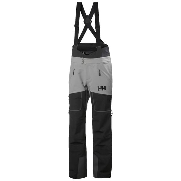 Spodnie narciarskie typu ogrodniczki Helly Hansen Odin BC Softshell. Niebieskie spodnie sportowe męskie Helly Hansen, m, bez wzorów, z softshellu, narciarskie. W wyprzedaży za 1,403.50 zł.