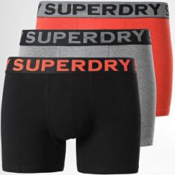 Bokserki z bawełny organicznej Superdry (x3). Brązowe bokserki męskie Superdry, bez wzorów, z bawełny. W wyprzedaży za 125.85 zł.