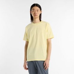 Koszulka męska New Balance MT41533PRC – żółta. Żółte koszulki sportowe męskie New Balance, m, bez wzorów, z dresówki, bez ramiączek. Za 119.99 zł.