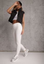 Białe Legginsy Basic z Modelującą Wstawką w Pasie Liacan. Białe legginsy damskie Renee, bez wzorów, z jeansu. Za 49.99 zł.