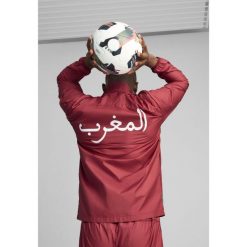 Męska tkana kurtka przedmeczowa Maroko PUMA Intense Red Archive Green. Czerwone kurtki męskie Puma, m, bez wzorów, sportowe, bez kaptura. W wyprzedaży za 322.50 zł.