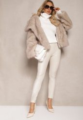 Białe Legginsy z Imitacji Skóry High Waist Ozdobione Wsuwanymi Kieszeniami Valerievia. Białe legginsy damskie Renee, bez wzorów, z jeansu. Za 29.99 zł.