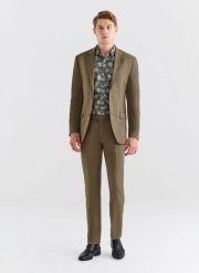 PAKO LORENTE – Zielone spodnie garniturowe z wełną. Zielone eleganckie spodnie męskie Pako Lorente, bez wzorów, z lycry. Za 499.99 zł.