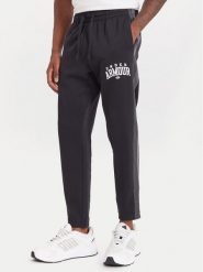 Under Armour Spodnie dresowe Ua Rival Fleece Colorblock 6003954 Czarny Loose Fit. Czarne spodnie sportowe męskie Under Armour, l, bez wzorów, z bawełny. Za 249.99 zł.