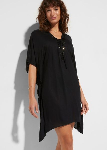 Prześwitująca tunika plażowa z wiskozy. Czarne sukienki damskie bonprix, na plażę, bez wzorów, z wiskozy, bez kołnierzyka, bez ramiączek. Za 112.99 zł.
