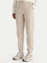 Reebok Spodnie dresowe Reebok X Ewa Chodakowska Evren RK25308CCW Beżowy Regular Fit. Brązowe spodnie dresowe damskie Reebok, bez wzorów, z dresówki. Za 179.99 zł.