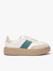 Sneakersy z zielonym akcentem. Brązowe obuwie sportowe damskie Ryłko, bez wzorów, ze skóry, z okrągłym noskiem, bez zapięcia. Za 429.99 zł.