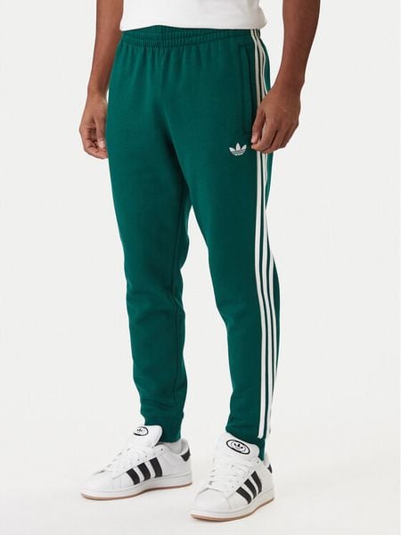 Adidas Spodnie dresowe 3-Stripes KE3559 Zielony Slim Fit. Zielone spodnie sportowe męskie Adidas, l, bez wzorów, z bawełny. Za 259.99 zł.