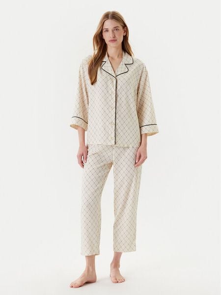 United Colors Of Benetton Piżama 4T3U3P00R Écru Relaxed Fit. Piżamy damskie United Colors Of Benetton, bez wzorów, z wiskozy, bez ramiączek. Za 249.99 zł.