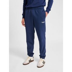 Spodnie do biegania Hummel Legacy 2.0. Niebieskie spodnie materiałowe męskie Hummel, bez wzorów, z dresówki. Za 261.50 zł.