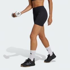 Legginsy z dzianiny o długości 4 cali Workout Essentials. Niebieskie legginsy damskie Adidas, bez wzorów, z dzianiny. Za 129.00 zł.