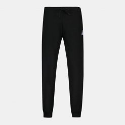 Wąskie spodnie do biegania Le Coq Sportif Pantalon de jogging ample Le Coq Sport. Czarne spodnie sportowe męskie le coq sportif, m, bez wzorów, do biegania. Za 317.95 zł.