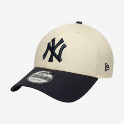 Czapka baseballówka z daszkiem New Era New York Yankees. Czapki damskie New Era, bez wzorów, z bawełny, sportowe. Za 119.99 zł.