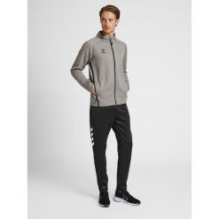 Bluza dresowa zapinana na zamek błyskawiczny Hummel Cima XK. Szare bluzy męskie Hummel, xl, bez wzorów, z dresówki, sportowe, bez ramiączek, bez kaptura. W wyprzedaży za 232.60 zł.