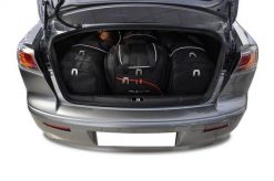 Torby Do Bagażnika Mitsubishi Lancer Limousine 2007-2016 4Szt Kjust. Czarne torby podróżne damskie KJUST, bez wzorów, z kauczuku. Za 1,220.00 zł.