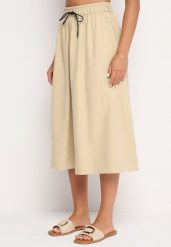 Beżowa Rozkloszowana Spódnica z Gumką w Pasie i Ściągaczem Xegelia. Brązowe spódnice damskie Born2be, na co dzień, uniwersalny, bez wzorów, eleganckie, midi, dopasowane. Za 69.99 zł.