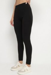 Czarne Klasyczne Legginsy z Bawełny Zivolea. Czarne legginsy damskie Born2be, bez wzorów, z bawełny. Za 39.99 zł.
