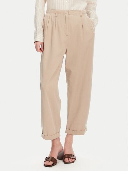 Tommy Hilfiger Spodnie materiałowe WW0WW45589 Beżowy Relaxed Fit. Brązowe spodnie materiałowe damskie Tommy Hilfiger, bez wzorów, z bawełny. Za 349.99 zł.