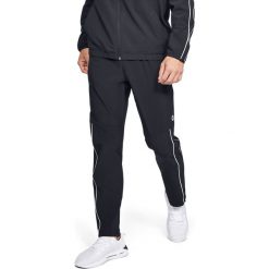 Under Armour Spodnie dresowe Czarny. Czarne spodnie sportowe męskie Under Armour, l, bez wzorów, z bawełny. Za 550.95 zł.