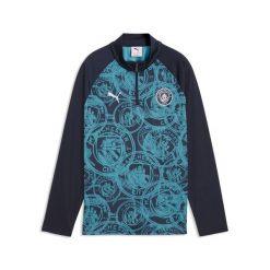 Młodzieżowa koszulka na rozgrzewkę Manchester City z zamkiem 1/4 PUMA. Niebieskia bluzki damskie Puma, m, bez wzorów, młodzieżowe, bez kołnierzyka, bez ramiączek. Za 319.00 zł.