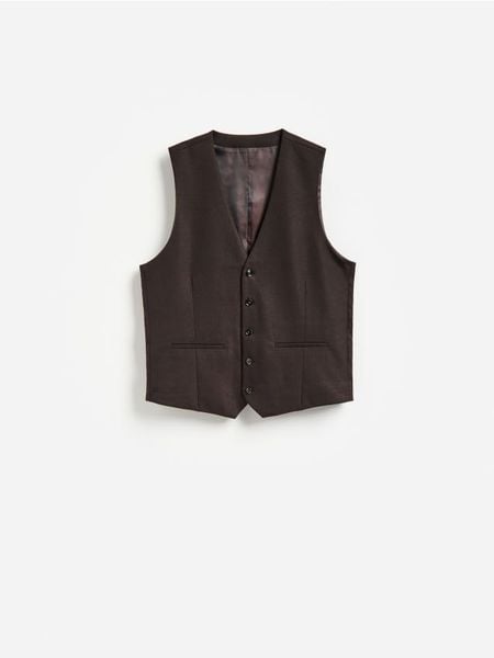 Garniturowa kamizelka - ciemnobrązowy. Brązowe garnitury męskie Reserved, l, bez wzorów, z tkaniny. Za 159.99 zł.