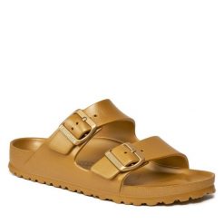 Klapki Birkenstock. Żółte klapki damskie Birkenstock, bez wzorów, bez obcasa, bez zapięcia. Za 249.99 zł.