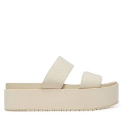 Klapki Calvin Klein Jeans. Klapki damskie Calvin Klein Jeans, bez wzorów, z jeansu, bez obcasa, bez zapięcia. Za 199.99 zł.