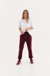 LEKKIE SPODNIE CELINE BORDOWE S - Flawless. Czerwone spodnie dresowe damskie Flawless, bez wzorów, z bawełny, klasyczne. Za 231.00 zł.