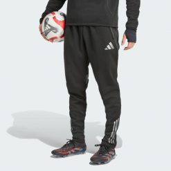 Spodnie Tiro 25 Competition Winterized. Czarne spodnie sportowe męskie Adidas, bez wzorów, z dresówki, na fitness i siłownię. Za 279.00 zł.