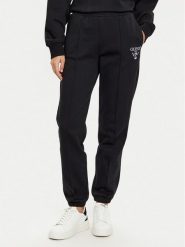 Guess Spodnie dresowe V5RB13 KC3D2 Czarny Regular Fit. Czarne bluzy damskie Guess, z aplikacjami, z bawełny. Za 259.99 zł.