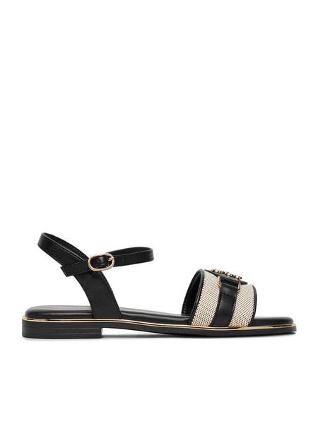 Nine West Klapki CEO-6165-33 Czarny. Czarne klapki damskie Nine West, bez wzorów, z materiału, bez obcasa, na płaskiej podeszwie, bez zapięcia. Za 124.99 zł.